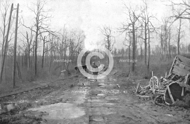 ''Le Champ de Bataille; La route "marmitee"', 1916 (1924) Creator: Unknown.