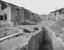 Le Champ de Bataille; Une vue de Cumieres au debut de mai, pendant l'effort..., 1916 (1924) Creator: Unknown