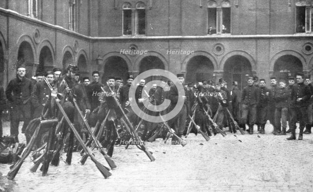 ''Le Defense de Liege; Le 9 de ligne quitte Bruxelles pour se rendre a Liege', 1914. Creator: Henneber.