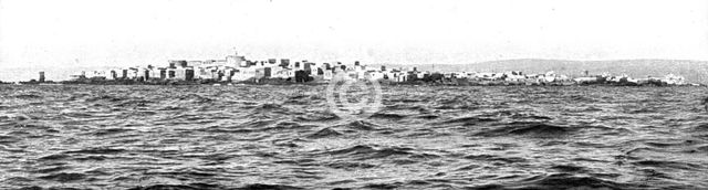 'Le drapeau Francais sur la cote Syrienne; L'ile Rouad, a 2 kilomtres de la cote..., 1915 (1924). Creator: Unknown.
