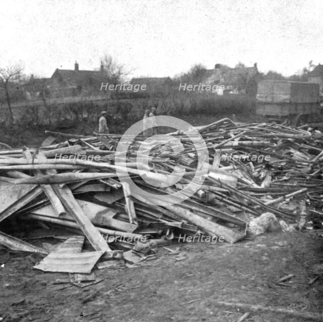 'Le Royaume de la Mort'; Gouttieres et feuilles de zinc que les allemands avaient amasses et qu'ils  Creator: Unknown.