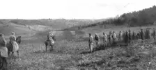 Le roi Pierre de Serbie, sur le front Nord, visitant ses soldsts qui travaillaient a des..., 1915. Creator: R. Marianovitch
