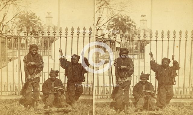 Let brotherly love prevail. [Young chimney sweeps leaning on a fence], (1868-1900?). Creator: Unknown.