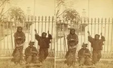 Let brotherly love prevail. [Young chimney sweeps leaning on a fence], (1868-1900?). Creator: Unknown