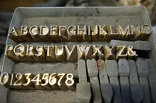 Letter stamps, Whitechapel Bell Foundry, 32-34 Whitechapel Road, Tower Hamlets, London, 2010 Artist: Derek Kendall