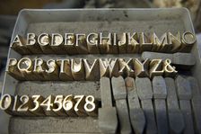 Letter stamps, Whitechapel Bell Foundry, 32-34 Whitechapel Road, Tower Hamlets, London, 2010 Artist: Derek Kendall