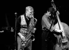 Lew Tabackin and Philippe Aerts, Brecon Jazz Festival, Brecon, Powys, Wales, 1999. Artist: Brian O'Connor