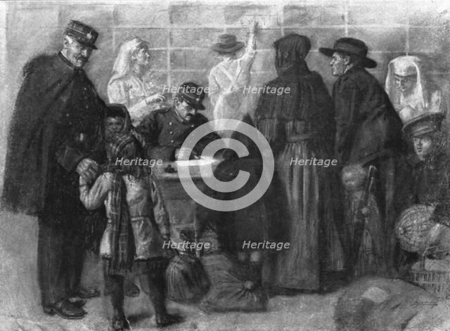 'L'exode devant l'ennemi; Les refugies a Paris: on releve l'identite de chacun et on..., 1918. Creator: Unknown.