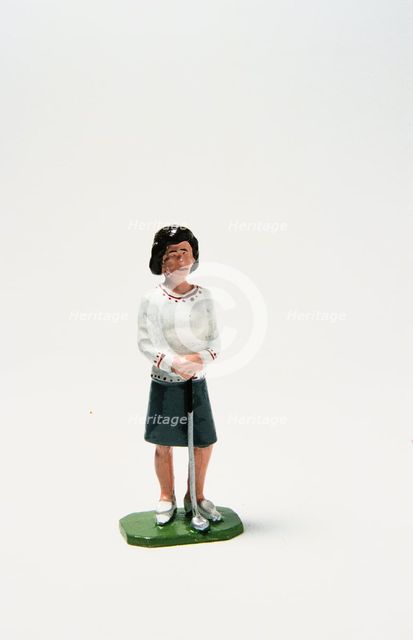 Lead figure of woman golfer, c1920s. Artist: Unknown