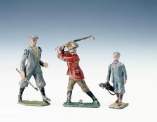 Lead figures of golfers, c1920s