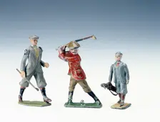 Lead figures of golfers, c1920s. Creator: Unknown