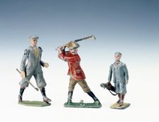 Lead figures of golfers, c1920s. Creator: Unknown