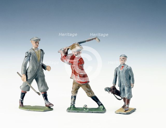 Lead figures of golfers, c1920s. Creator: Unknown.