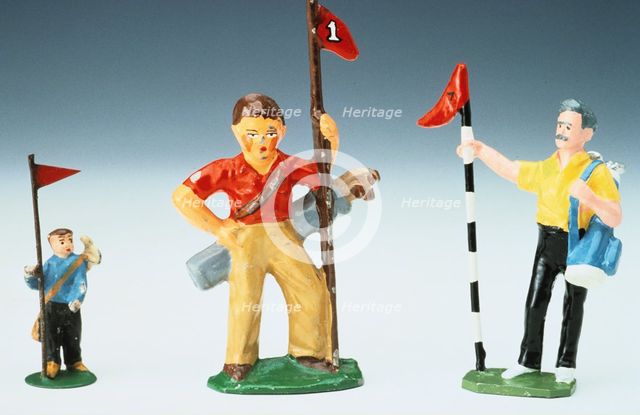 Lead golf caddy figures, 20th century. Creator: Unknown.