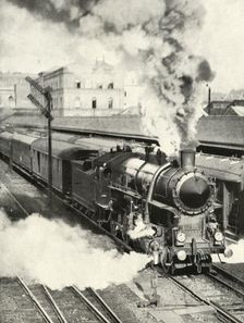 Leaving Budapest. An express train departs from the Central Station 1935-36. Creator: Unknown