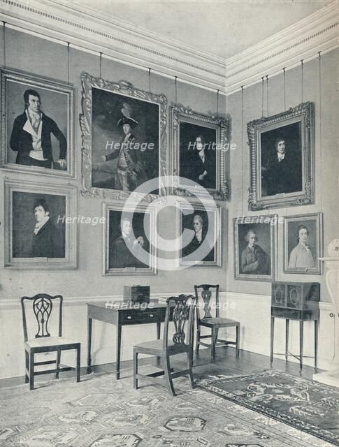 Leaving Portraits in the Drawing-Room', 1926. Artist: Unknown.