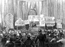 Lecture to working men on ornamental ironwork at the South Kensington Museum, 1870. Creator: D H F