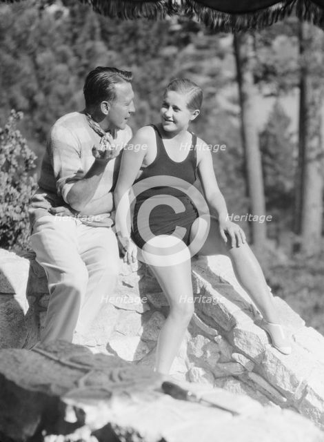 Lee, Margaret, Miss, and unidentified man, seated outdoors, 1927 Creator: Arnold Genthe.