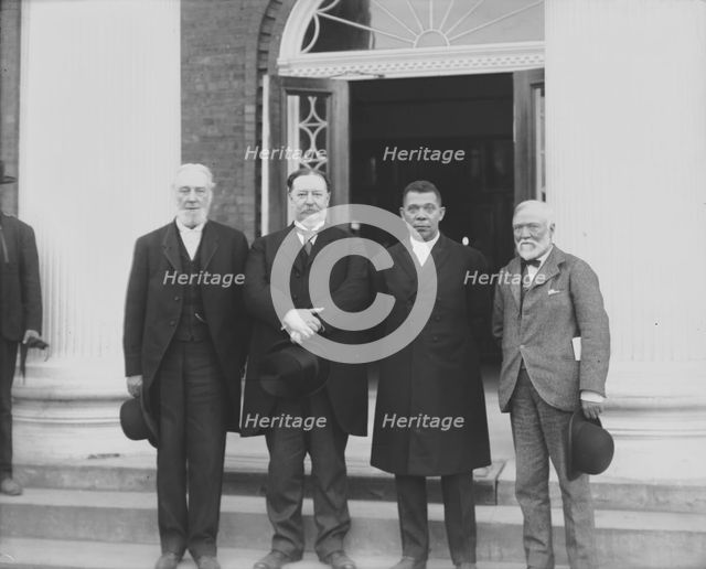 (Left to right) Robert C. Ogden, U.S. Secretary of War William Howard Taft, Booker T..., 1906. Creator: Frances Benjamin Johnston.