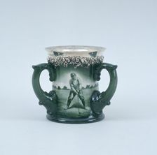 Lenox hand-painted three-handled toasting mug with silver rim, c1902. Creator: Unknown