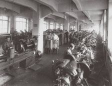 Lens Processing at the Factory of the Optical Mechanical Association in Petersburg, 1916. Artist: Anonymous