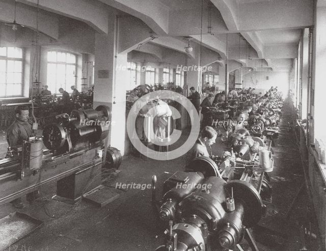 Lens Processing at the Factory of the Optical Mechanical Association in Petersburg, 1916. Artist: Anonymous  