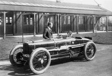 Leo Cozens and May Cunliffe with 1924 Sunbeam Grand Prix car. Creator: Unknown