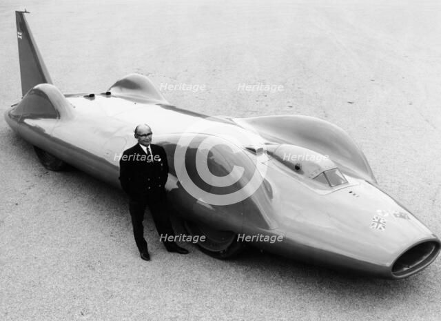 Leo Villa with the 1964 Bluebird, (c1964?). Artist: Unknown