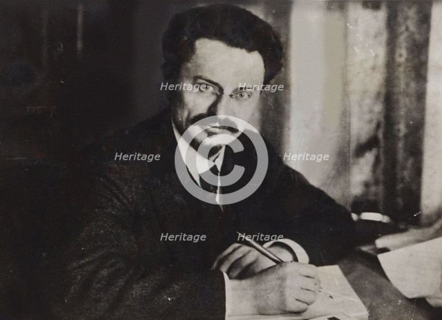 Le?on Trotsky at his writing desk , Early 1920s. Creator: Anonymous.