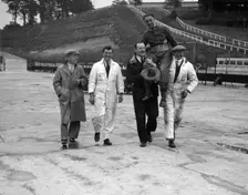 Leon Cushman being carried aloft after making a successful speed record attempt, Brooklands, 1931. Artist: Bill Brunell