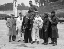 Leon Cushman being carried aloft after making a successful speed record attempt, Brooklands, 1931. Artist: Bill Brunell