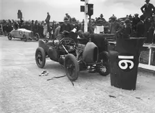 Leon Cushman working on his Bugatti Brescia at the JCC 200 Mile Race, Brooklands, Surrey, 1922. Artist: Bill Brunell