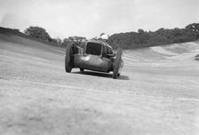 Leon Cushman's Austin 7 racer making a speed record attempt, Brooklands, 8 August 1931. Artist: Bill Brunell