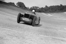 Leon Cushman's Austin 7 racer making a speed record attempt, Brooklands, 8 August 1931. Artist: Bill Brunell