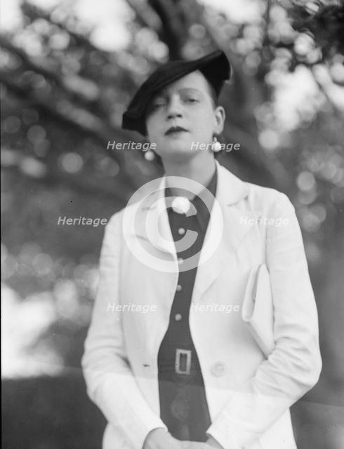 Leonard, Mrs., standing outdoors, between 1926 and 1938. Creator: Arnold Genthe.