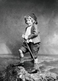 Leonard Schuster standing on a rock, facing left, 1893. Creators: Frank Meadow Sutcliffe, Arthur Schuster