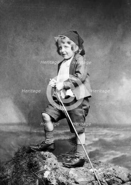 Leonard Schuster standing on a rock, facing left, 1893. Creators: Frank Meadow Sutcliffe, Arthur Schuster.