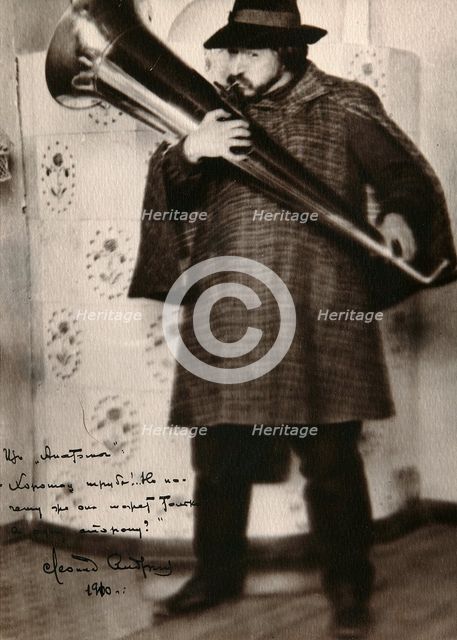 Leonid Andreyev, Russian author, playing a musical instrument, c1900. Artist: Unknown