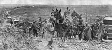 'Les Americains dans le Saillant de Saint-Mihiel; Un convoi de munitions franchissant..., 1918. Creator: Unknown