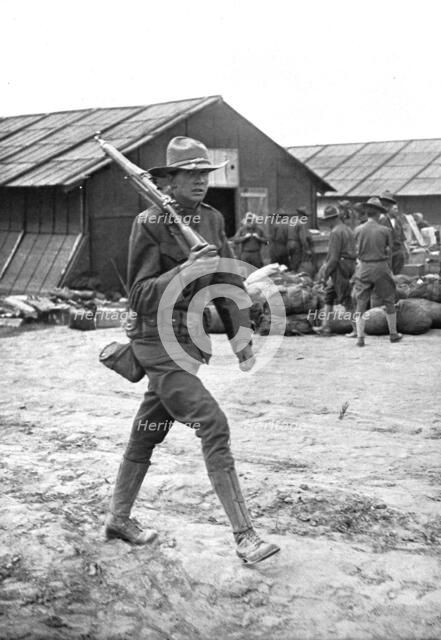 'Les <<Boys>> de L'Amerique; Au Camp Americain de Saint-Nazaire: une sentinelle', 1917. Creator: Jean Clair-Guyot.
