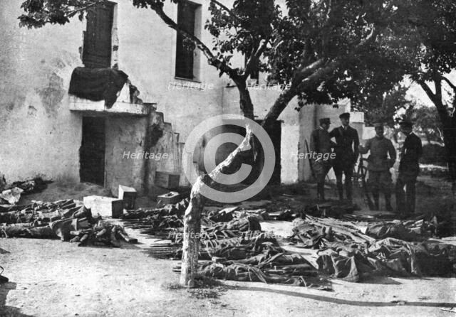 'Les Evenements de Grece; Les intrigues des royalistes: un lot de fusils enveloppes de..., 1917. Creator: Unknown.