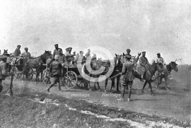 'Les Fuyards; Officiers russes et anglais des automobiles blindees arretant un convoi de..., 1917. Creator: Unknown.
