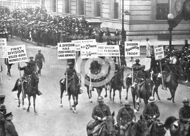 'Les fetes de la victoire a New-York; les herauts d'armes de la 1st division Americaine', 1919. Creator: Unknown.