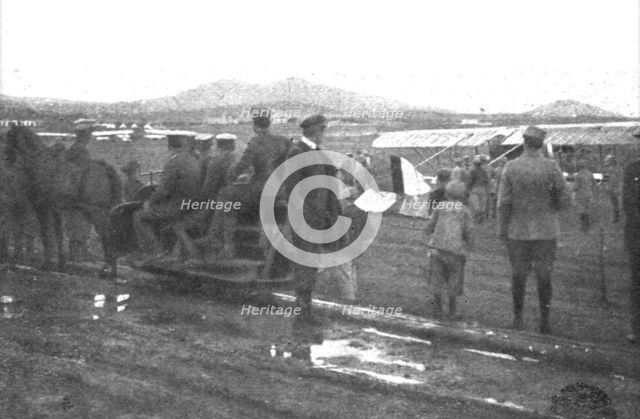 'Les premiers contingents Franco-Anglais a Salonique; Au camp d'aviation francais de...1915 (1924). Creator: Unknown.