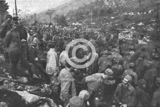 'Les succes Italiens du Carso; defile de prisonniers autrichiens apres les comabts du 1er..., 1916. Creator: Unknown.