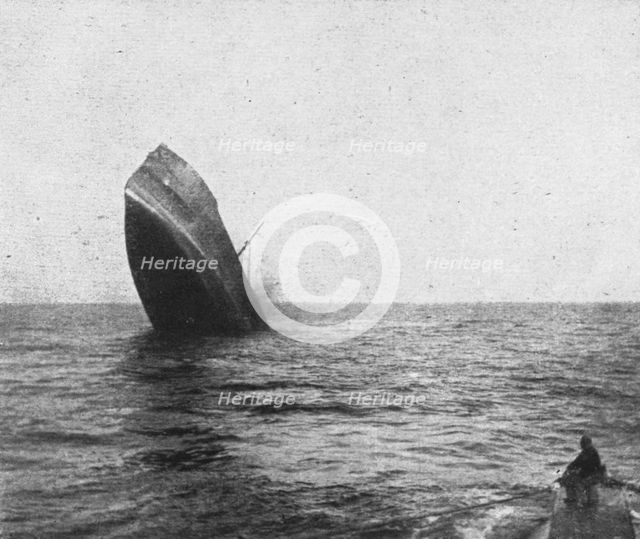 'Les sous-marins allemands a l'Oeuvre; Cargo piquant au fond par l'arriere', 1918. Creator: Unknown.