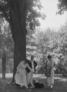 Leslie, Margeurite, and friends, standing under a tree, 1917 Aug. 18. Creator: Arnold Genthe