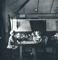 Lessons for London children in the village hall 1941. Artist: Cecil Beaton