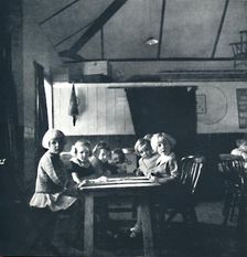 Lessons for London children in the village hall 1941. Artist: Cecil Beaton