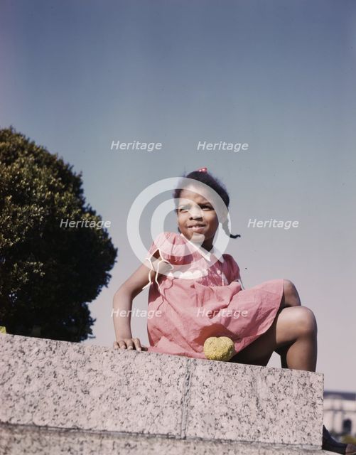 Little girl in a park near Union Station, Washington, D.C., ca. 1943. Creator: Unknown.
